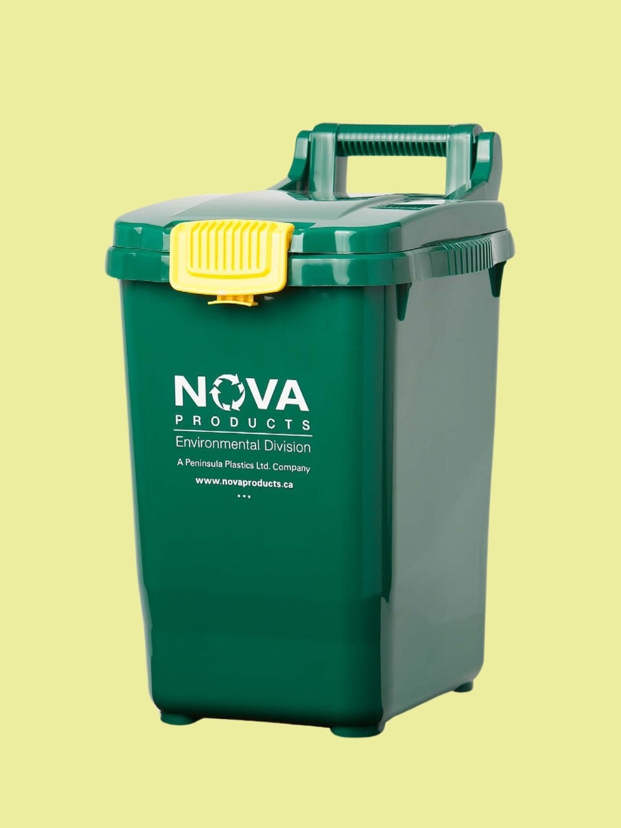 A photo of a green and yellow 7-gallon compost pail against a yellow background